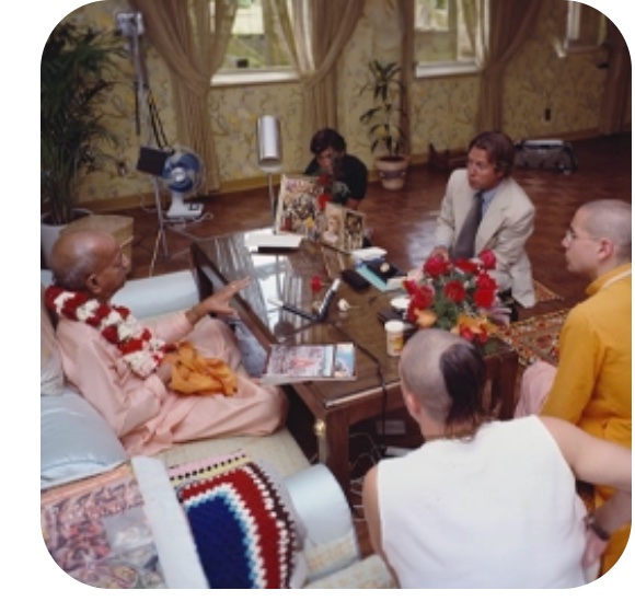 Srila Prabhupada in conversation with his disciples
